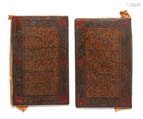 【R】Two lacquered bookcovers signed by Ahmad al-Nayrizi Persi...