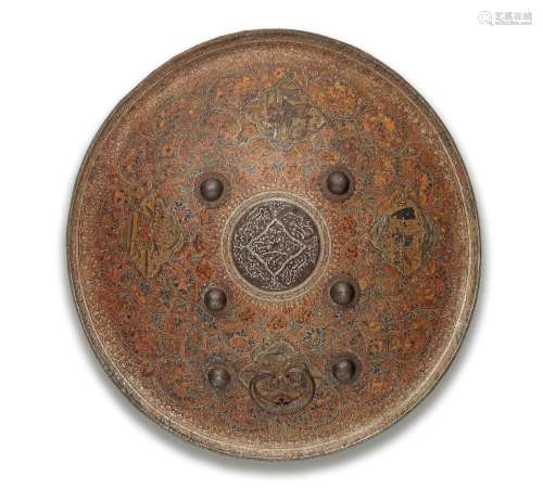 【R】A Qajar painted hide shield (dhal) Persia, dated AH 1336/...