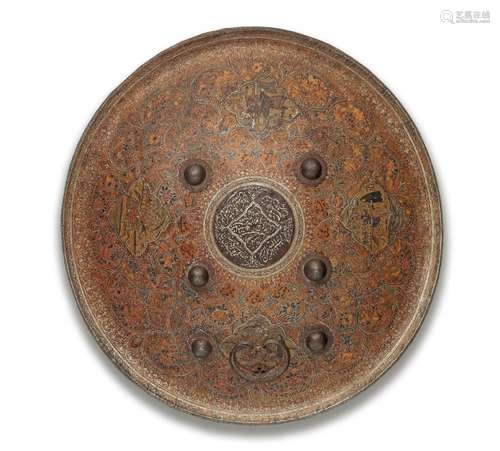 【R】A Qajar painted hide shield (dhal) Persia, dated AH 1336/...