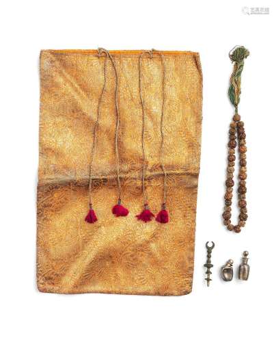 A set of prayer beads, two silver zamzam bottles, a metal th...