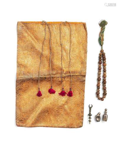 A set of prayer beads, two silver zamzam bottles, a metal th...