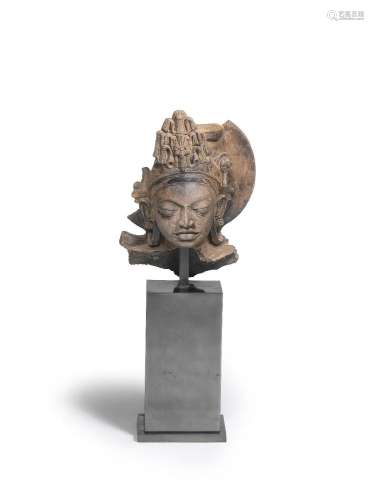 【*】A Gupta terracotta head of a deity Northern India, 5th Ce...