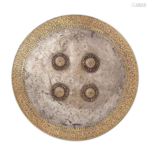 A gold koftgari steel shield (dhal) North India, 18th/ 19th ...