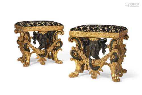 A PAIR OF GEORGE II EBONIZED AND PARCEL-GILT STOOLS CIRCA 17...