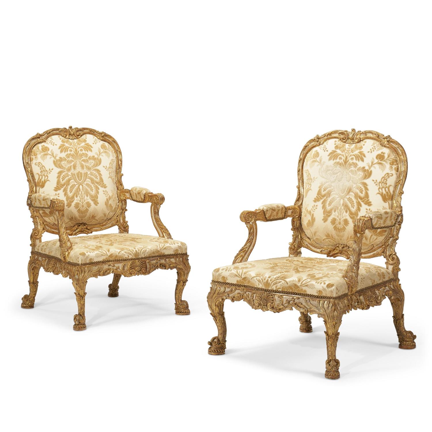 A PAIR OF GEORGE II WHITE-PAINTED AND PARCEL-GILT ARMCHAIRS