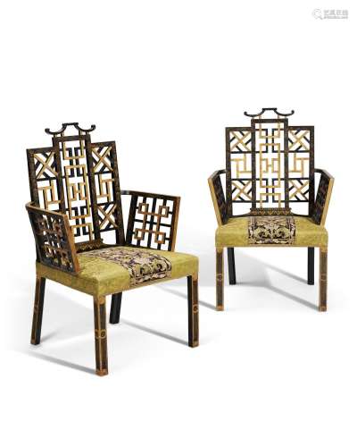 A PAIR OF GEORGE II BLACK-JAPANNED AND PARCEL-GILT ARMCHAIRS...