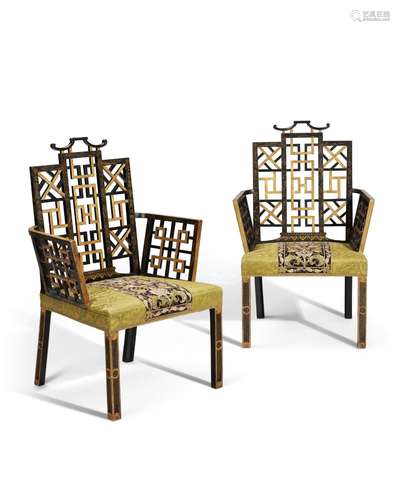 A PAIR OF GEORGE II BLACK-JAPANNED AND PARCEL-GILT ARMCHAIRS...