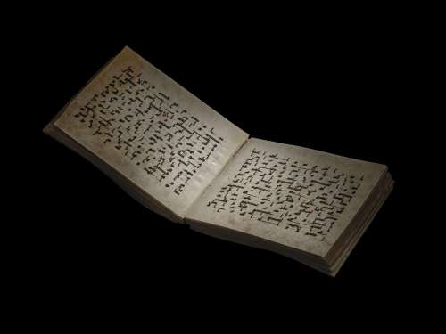 A KUFIC QUR'AN SECTION NEAR EAST OR NORTH AFRICA, 8TH/9TH CE...