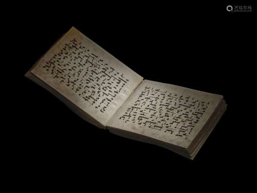 A KUFIC QUR'AN SECTION NEAR EAST OR NORTH AFRICA, 8TH/9TH CE...