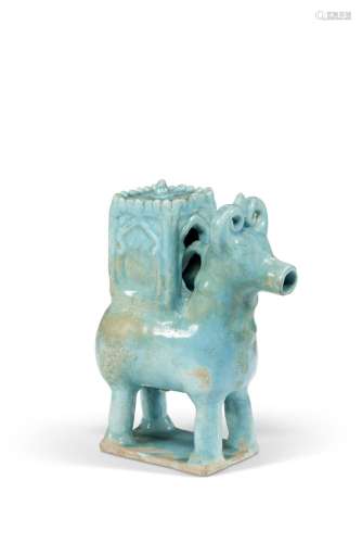 A KASHAN MOULDED POTTERY BULL ( GAV ) WITH HOWDAH IRAN, 12TH...