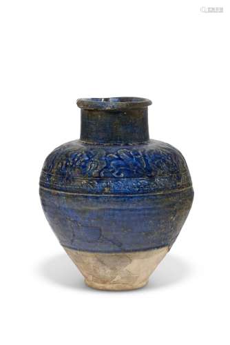 A NISHAPUR MOULDED POTTERY STORAGE JAR IRAN, 12TH CENTURY