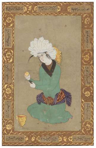 A KNEELING YOUTH HOLDING A CUP SAFAVID IRAN, CIRCA 1600