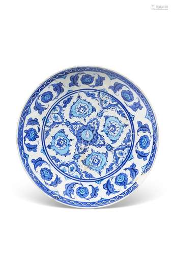 A RIMLESS IZNIK POTTERY DISH OTTOMAN TURKEY, CIRCA 1530