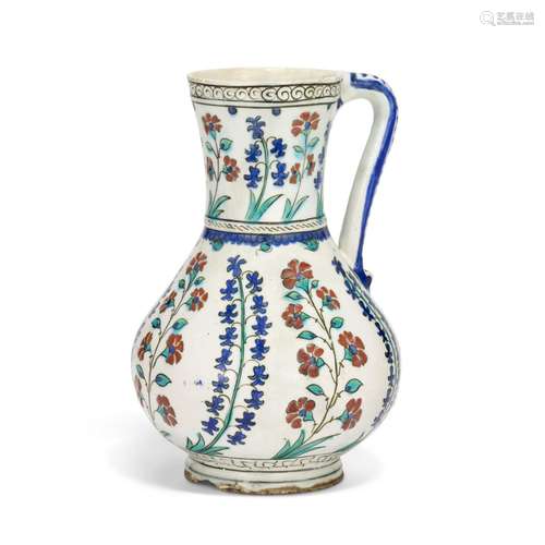 AN IZNIK POTTERY JUG OTTOMAN TURKEY, CIRCA 1575-80