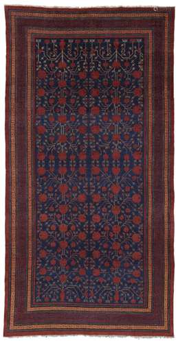 A KHOTAN CARPET EAST TURKESTAN, LATE 18TH / EARLY 19TH CENTU...