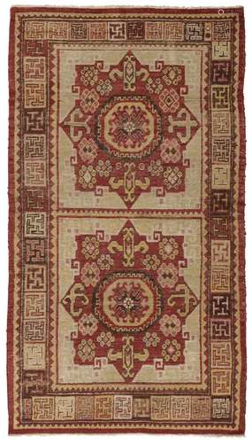 A KHOTAN RUG TARIM BASIN, EAST TURKESTAN, LATE 18TH CENTURY