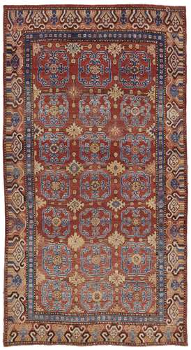 A KHOTAN CARPET EAST TURKESTAN, EARLY 19TH CENTURY