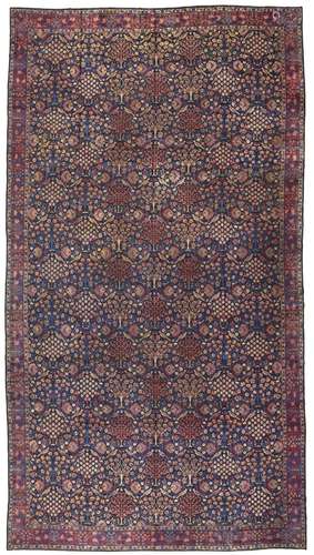 A LARGE KIRMAN CARPET SOUTH EAST PERSIA, CIRCA 1900