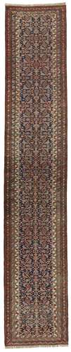 A BAKSHAISH RUNNER WEST PERSIA, CIRCA 1900