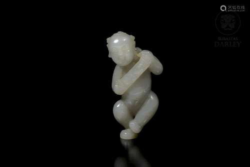 Jade figure 'Boy holding a plaque', Qing dynasty