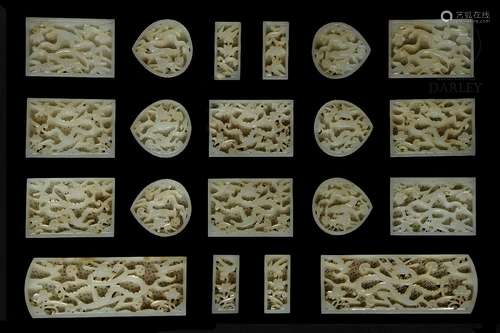 A set of twenty carved jade belt plaques, Ming dynasty