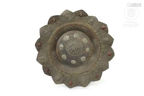 Large Tibetan embossed metal plate, 19th - 20th century