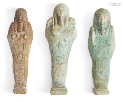 Three Egyptian glazed faience shabtis <br />
Late Dynastic P...