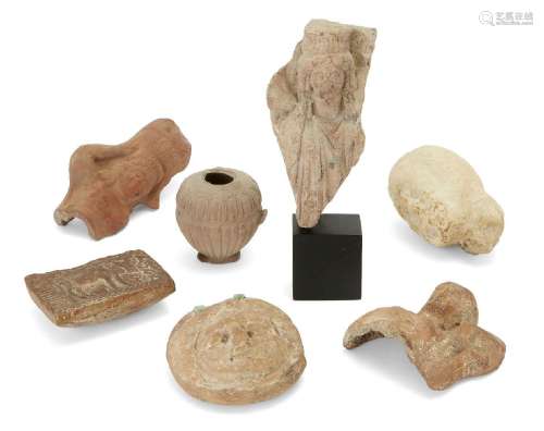 Five terracotta and marble antiquities, circa 4th Century B....