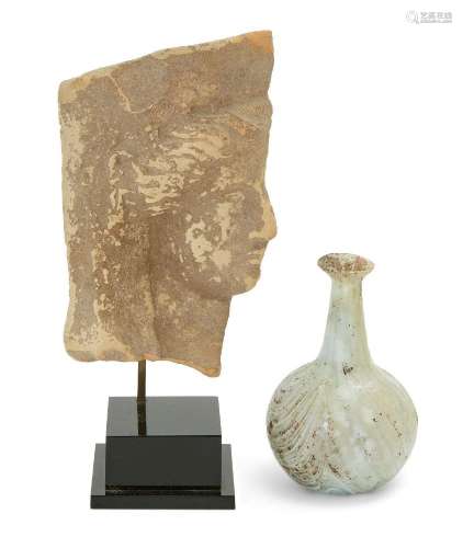 A Greek terracotta fragmentary head of Demeter<br />
Circa 5...