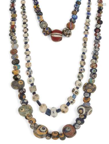 Two Eastern Mediterranean 'eye' bead necklaces<br />
Circa 5...
