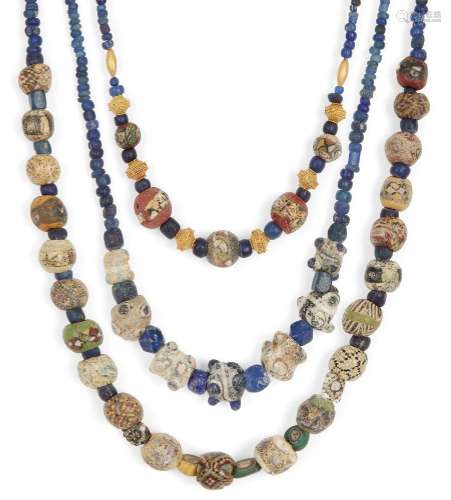 Two mostly Roman mosaic glass bead necklaces and an eye bead...