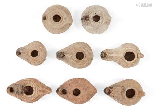 Eight Syrian-Palestinian pottery oil lamps<br />
Circa 5th-7...