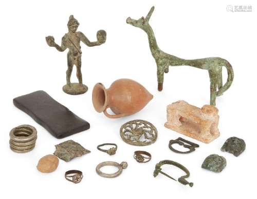 A miscellaneous group of bronze, silver, pottery and stone o...