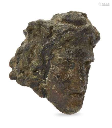 A Hellenistic fragmentary bronze hollow-backed head of a mal...