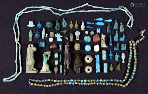 A miscellaneous group of Egyptian faience amulets, pendants ...