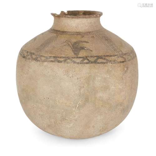 A buff pottery vessel, the sloping shoulders decorated in ad...