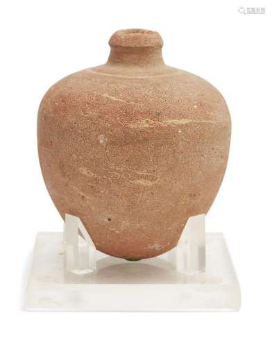 A Bronze Age buff pottery vessel <br />
Circa 1500-1200 B.C....