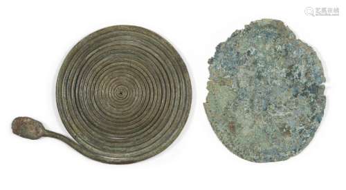 Two Italic bronze fibulae, circa 8th century B.C. , 10cm. di...
