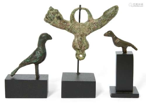 A Roman bronze phallic amulet, 1st-2nd Century A.D., and two...