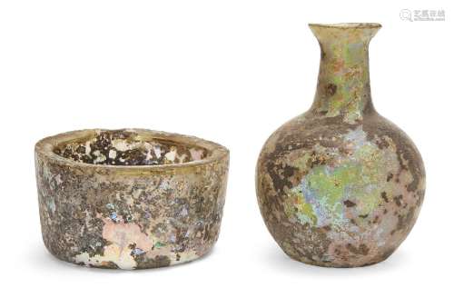 Two iridescent Roman glass vessels<br />
Circa 4th Century A...