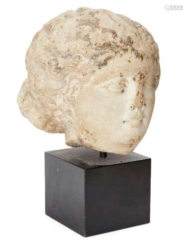 A marble female head<br />
After the Antique<br />
Her hair ...