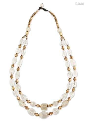 A double strand carved rock crystal bead necklace, composed ...