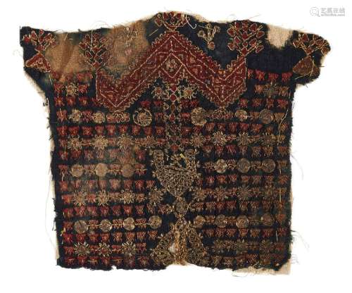 A Mamluk wool tunic fragment, Egypt or North Africa, 14th ce...