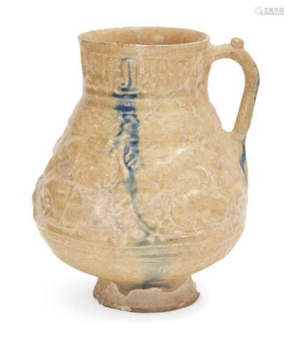 A Kashan calligraphic moulded pottery ewer, Central Iran, la...