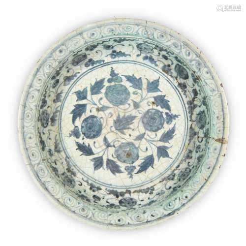 A Timurid blue and white pottery dish, Iran, probably Tabriz...