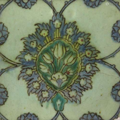 A Damascus Iznik tile, 17th century, of square form, part of...