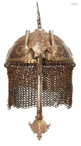 An Indo-Persian steel helmet with applied brass decoration, ...