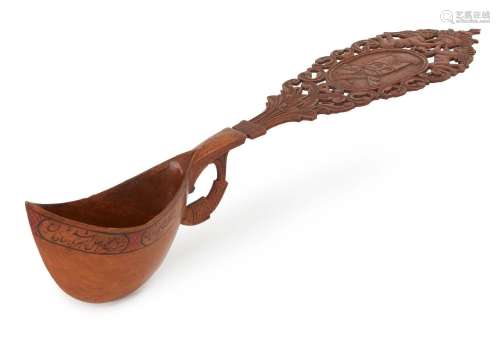 An inscribed pear-wood sherbert spoon (qashaq) with portrait...