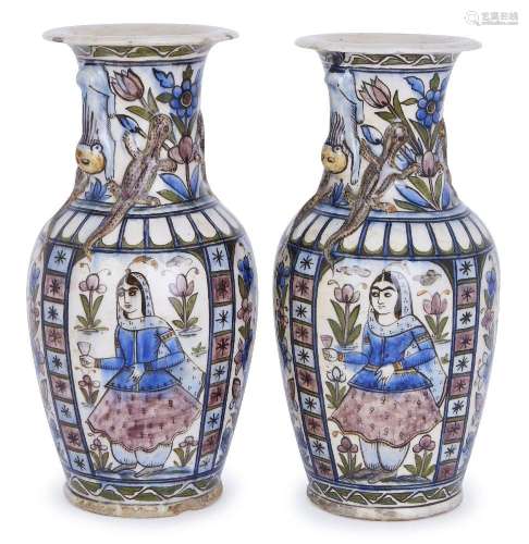 A pair of large Qajar moulded pottery vases, Iran, late 19th...