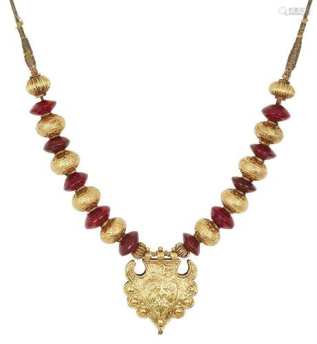 Property of a Lady<br />
A gold and carnelian bead necklace ...